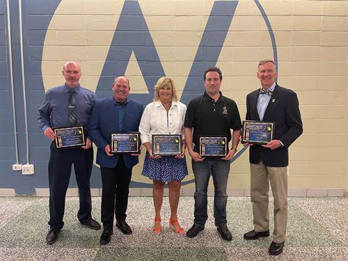 2023: Officer Scott King, Richard J. Marshall, Mary Jo Nawrocki, Michael A. Cardinale, and Neil Mansfield stand holding their awards 